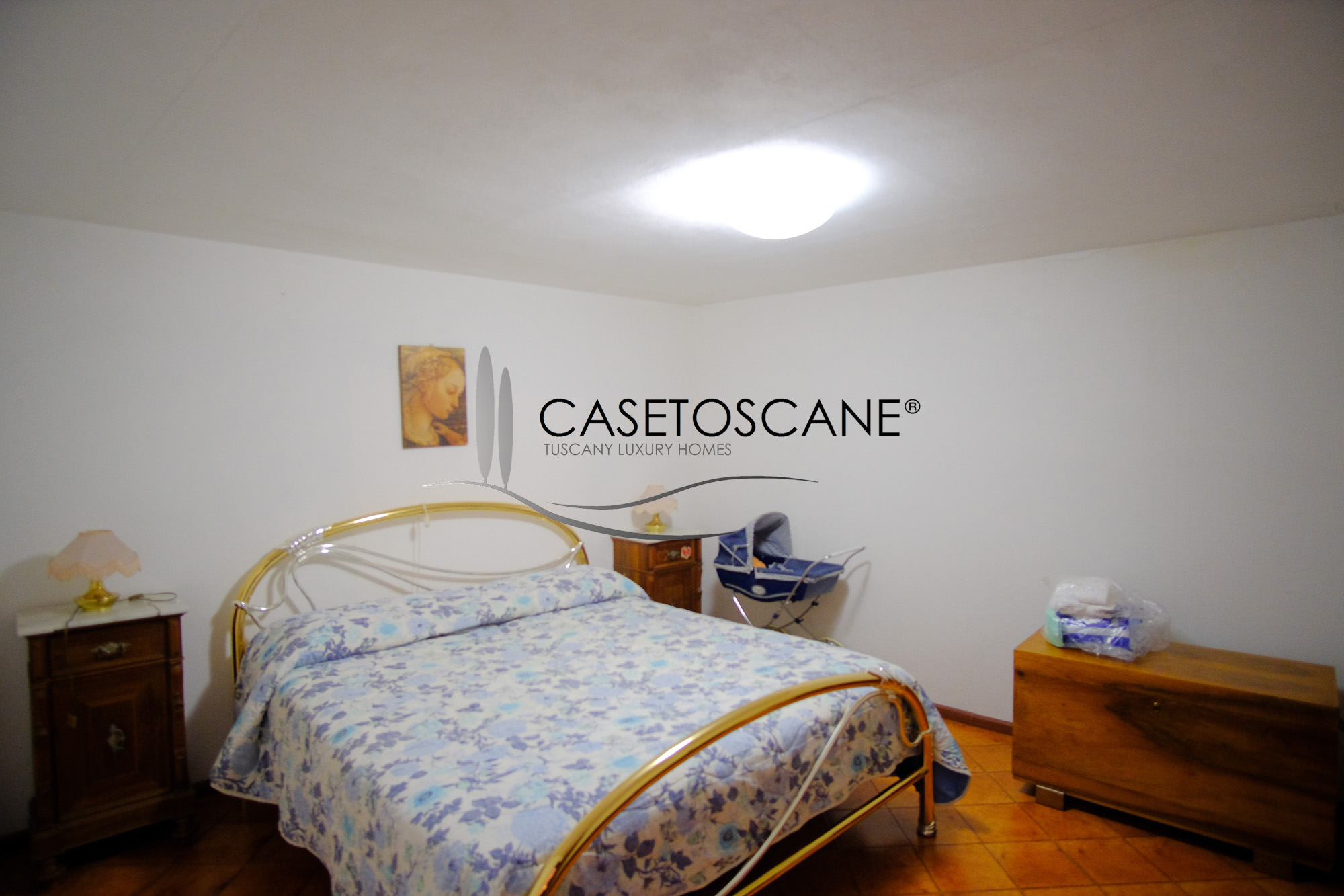 3243 - Terratetto di mq.200 circa in discrete condizioni generali, con bellissima terrazza-giardino nel centro storico di Lucignano (AR).